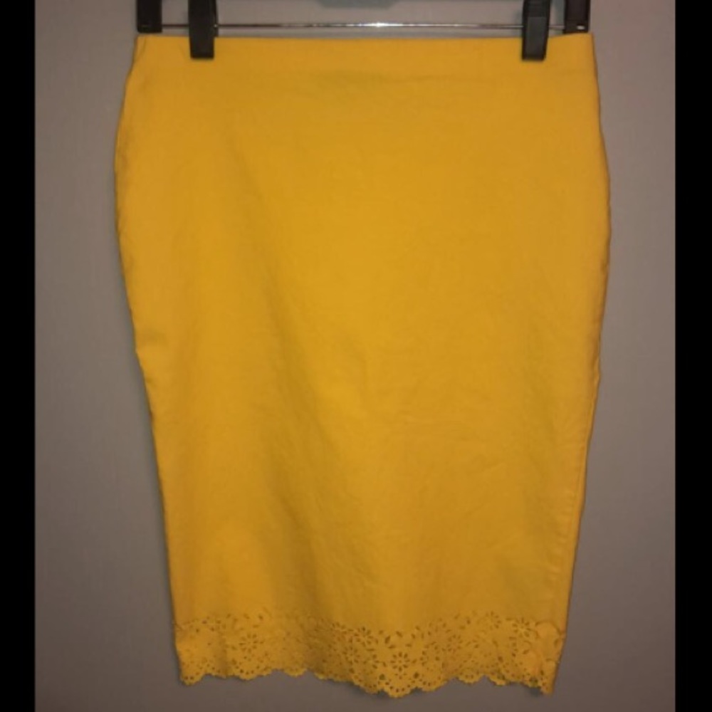 *Knee-Length Yellow Pencil Skirt, Lace Detail.*